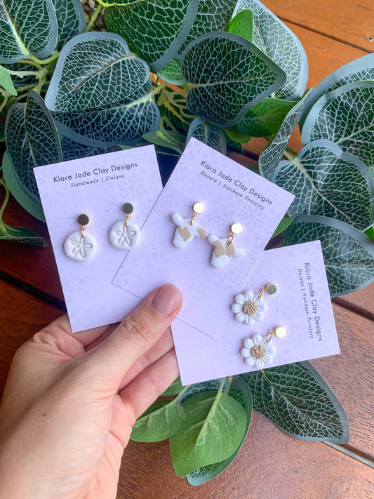 Sand Dollar, Cow & Daisy Dangles
